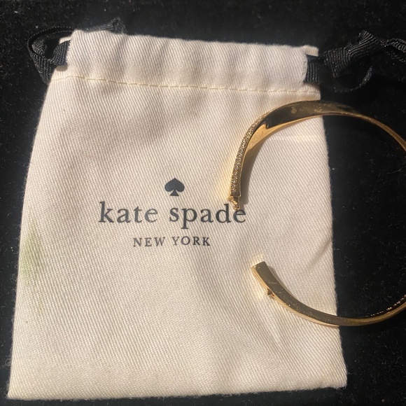 KATE SPADE gold bracelet with diamond detail on curve of band. Opens with clasp - Picture 4 of 4